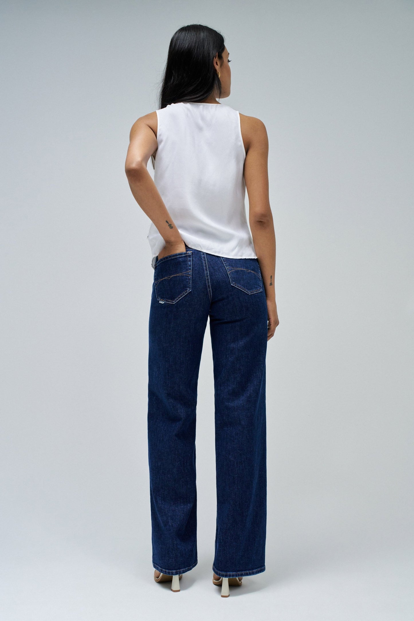 Sleeveless Drape Top with Metal Ring Detail